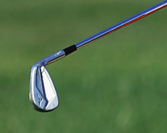Brooks Koepka with Mizuno JPX 919 irons, TaylorMade M5 driver in 