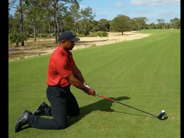 Tiger Woods hits must-see rocket drive off his knees to outdrive ...
